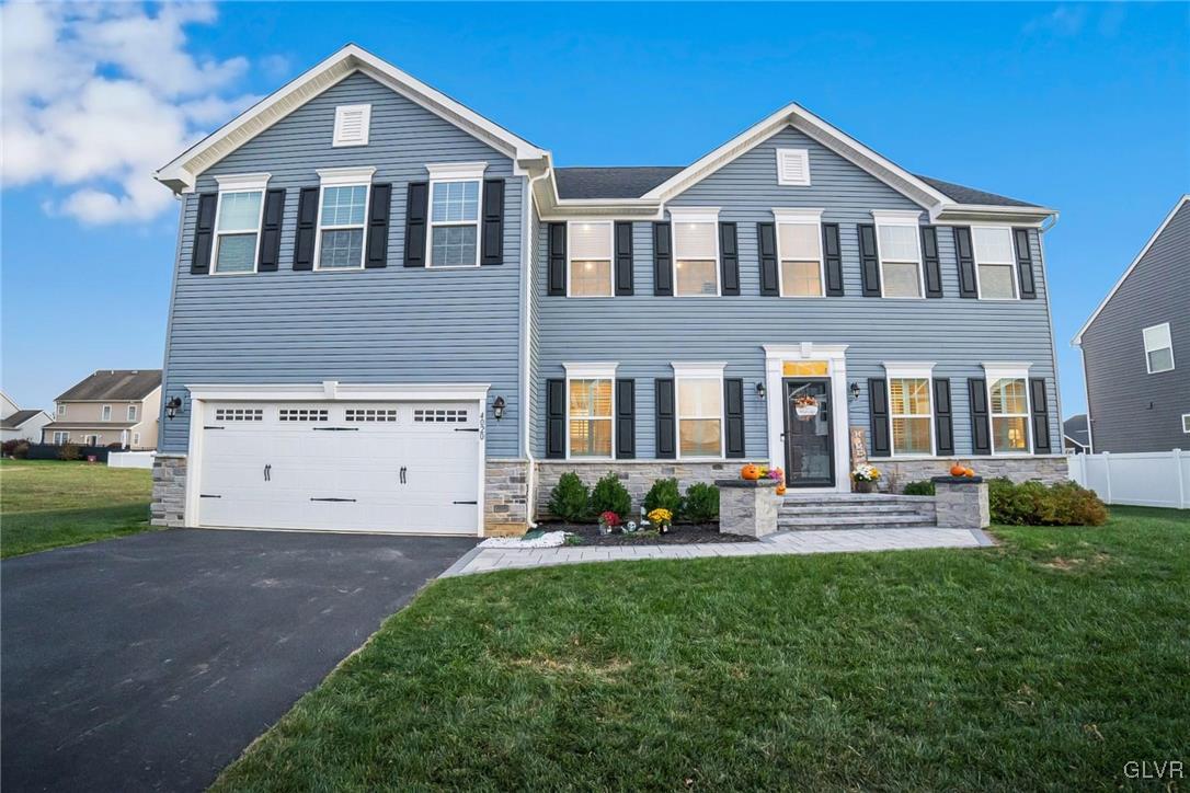 4020 Walter Road Bethlehem, PA 18020 - Photo 1 of 54 a front view of a house with garden