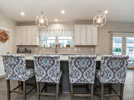 4020 Walter Road Bethlehem, PA 18020 - Photo 16 of 54 a kitchen with a dining table chairs sink and cabinets