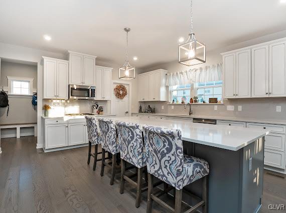 4020 Walter Road Bethlehem, PA 18020 - Photo 17 of 54 a kitchen with kitchen island granite countertop a sink counter and chairs