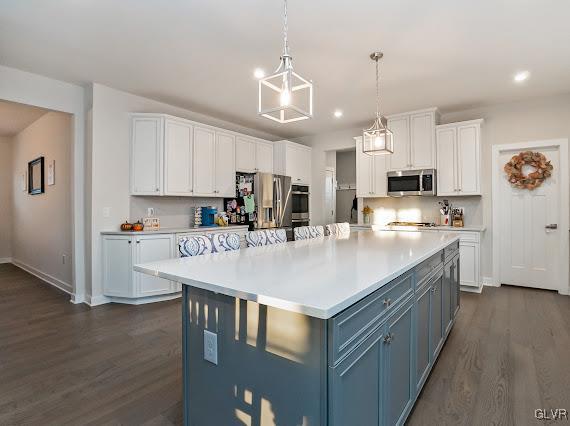 4020 Walter Road Bethlehem, PA 18020 - Photo 20 of 54 a kitchen with kitchen island white cabinets and stainless steel appliances