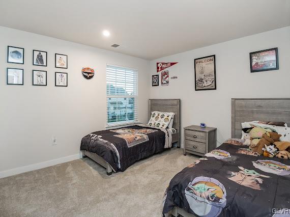 4020 Walter Road Bethlehem, PA 18020 - Photo 40 of 54 a spacious bedroom with a bed and a table in it