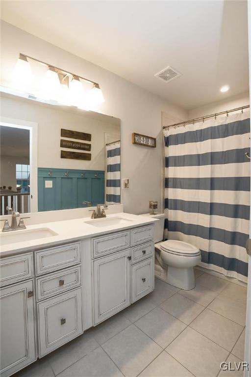 4020 Walter Road Bethlehem, PA 18020 - Photo 42 of 54 a bathroom with a double vanity sink a toilet and a shower