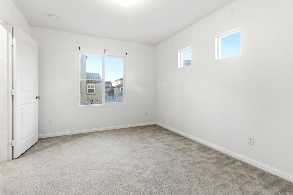 1508 Carpinteria Street Chula Vista, CA 91913 - Photo 28 of 39 an empty room with a window