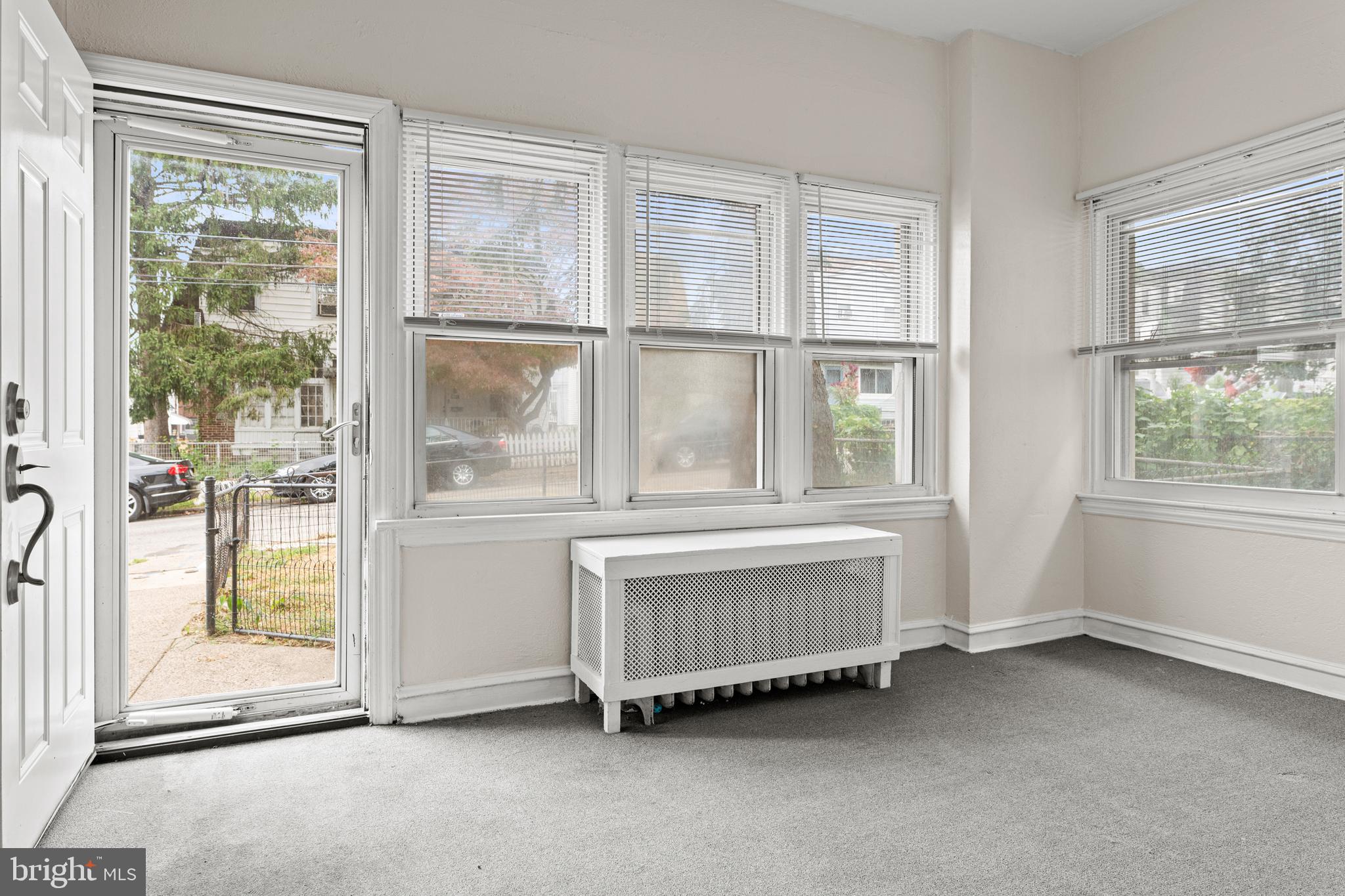 221 Barrington Road Upper Darby, PA 19082 - Photo 3 of 29 an empty room with a window