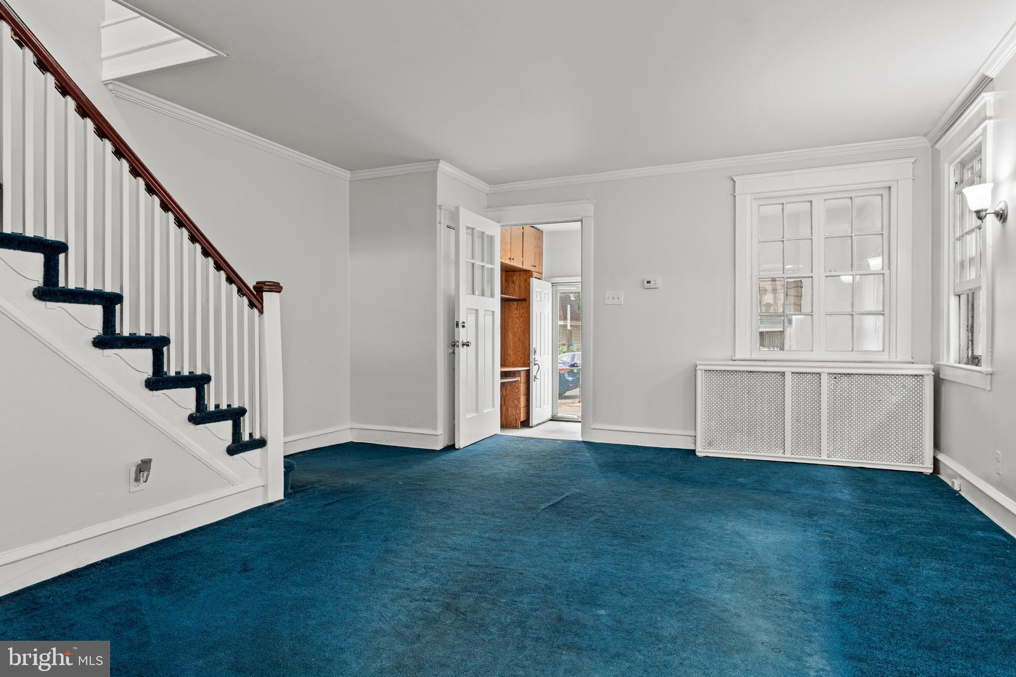 221 Barrington Road Upper Darby, PA 19082 - Photo 7 of 29 a view of an entryway with wooden floor and stairs