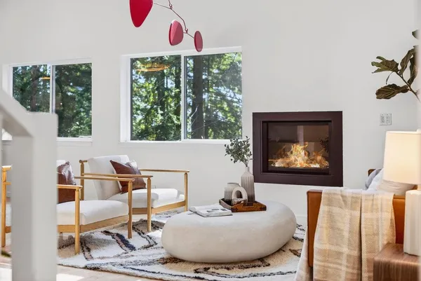a living room with furniture and a window