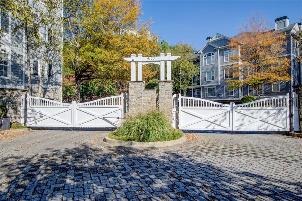 4100 Paces Walk Southeast, Unit 1306 Atlanta, GA 30339 - Photo 1 of 32 a view of a building with a bench