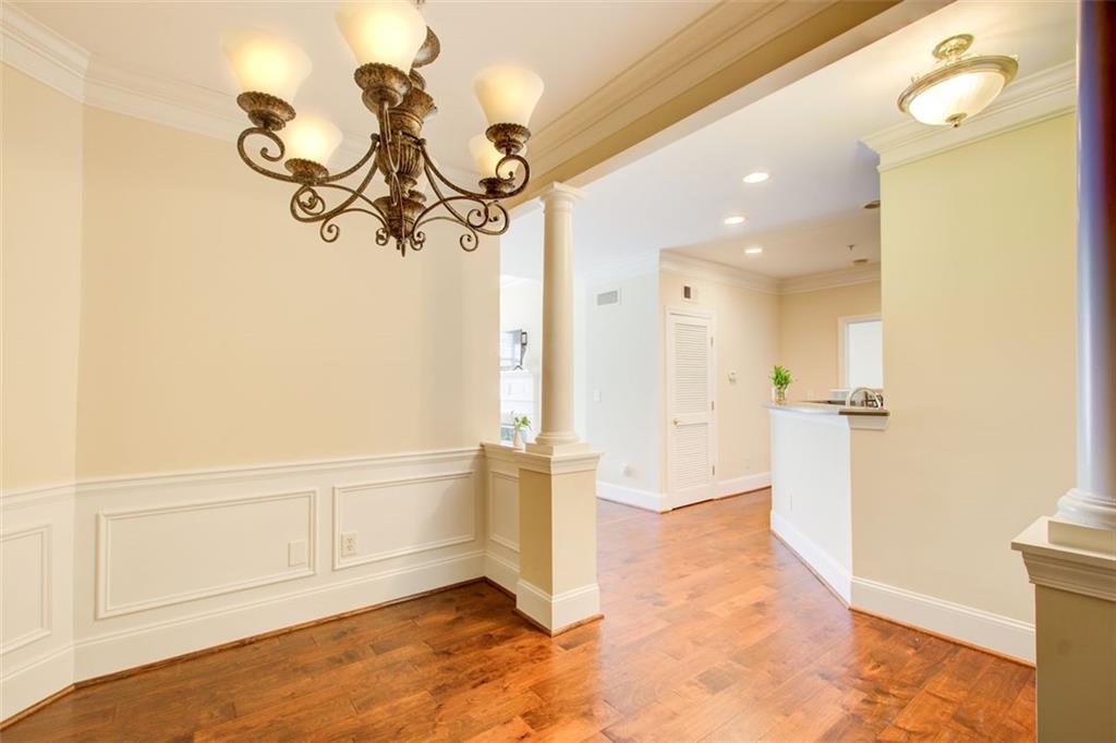4100 Paces Walk Southeast, Unit 1306 Atlanta, GA 30339 - Photo 7 of 32 a view of a room with wooden floor