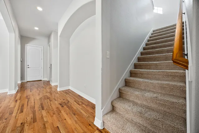 a view of entryway with wooden floor