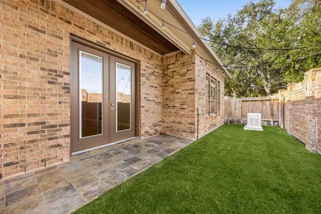 a view of a back yard of the house