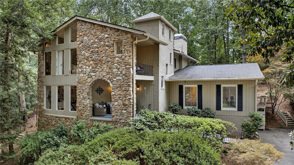 7565 Ball Mill Road Northeast Atlanta, GA 30350 - Photo 1 of 61 front view of a house with a yard