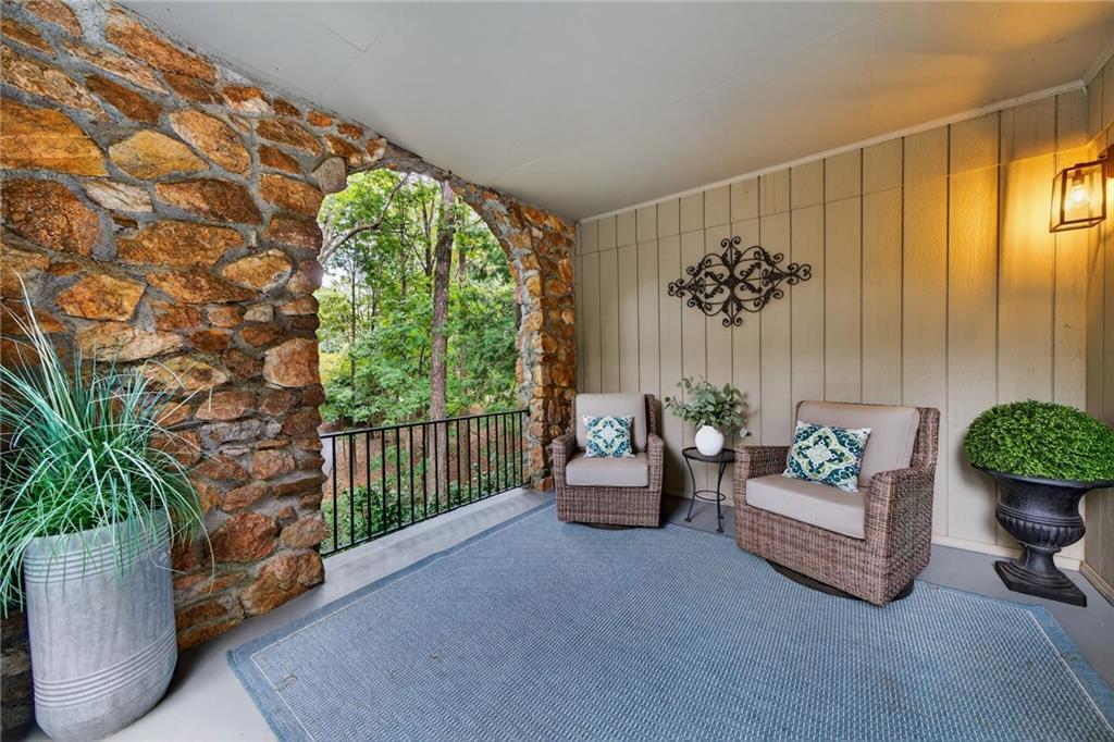 7565 Ball Mill Road Northeast Atlanta, GA 30350 - Photo 17 of 61 a living room with furniture and a potted plant