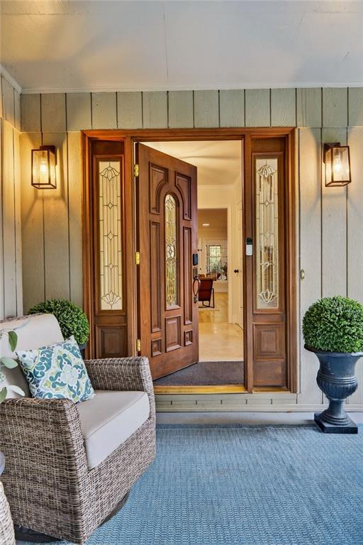 7565 Ball Mill Road Northeast Atlanta, GA 30350 - Photo 18 of 61 a living room with furniture and wooden floor