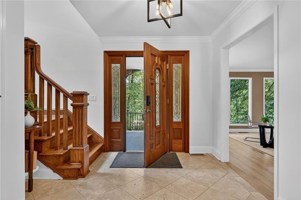 7565 Ball Mill Road Northeast Atlanta, GA 30350 - Photo 20 of 61 a view of an entryway with wooden floor and door