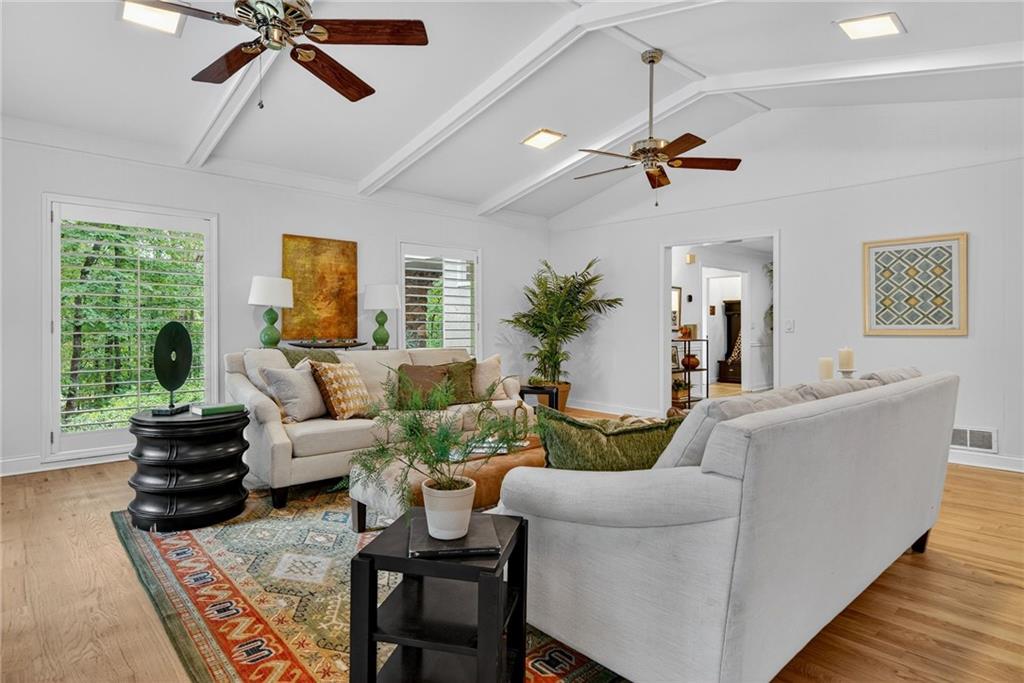 7565 Ball Mill Road Northeast Atlanta, GA 30350 - Photo 22 of 61 a living room with furniture and a window