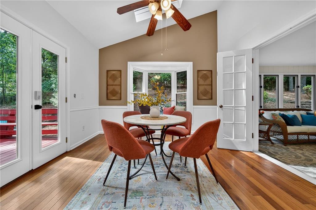 7565 Ball Mill Road Northeast Atlanta, GA 30350 - Photo 26 of 61 a view of a dining room with furniture window and outside view