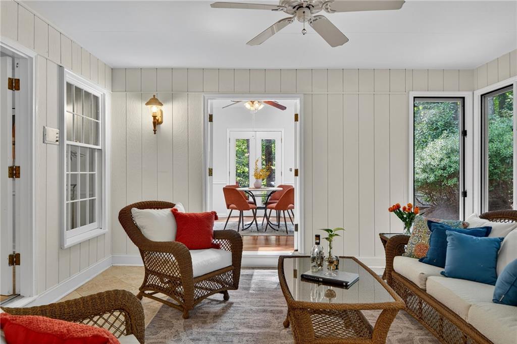 7565 Ball Mill Road Northeast Atlanta, GA 30350 - Photo 27 of 61 a living room with furniture and a potted plant