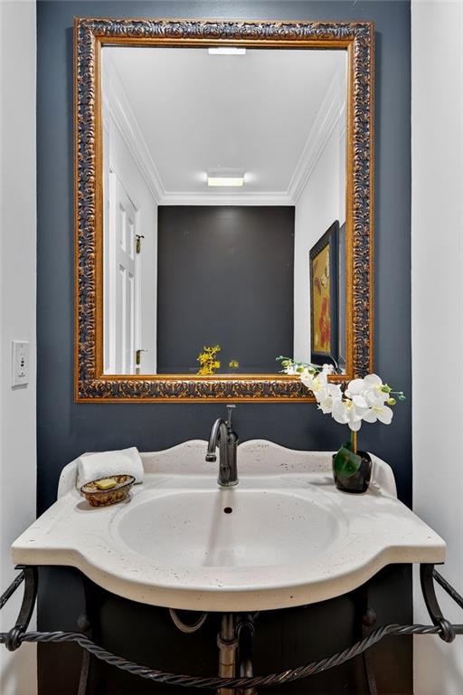 7565 Ball Mill Road Northeast Atlanta, GA 30350 - Photo 31 of 61 a bathroom with a sink and a mirror