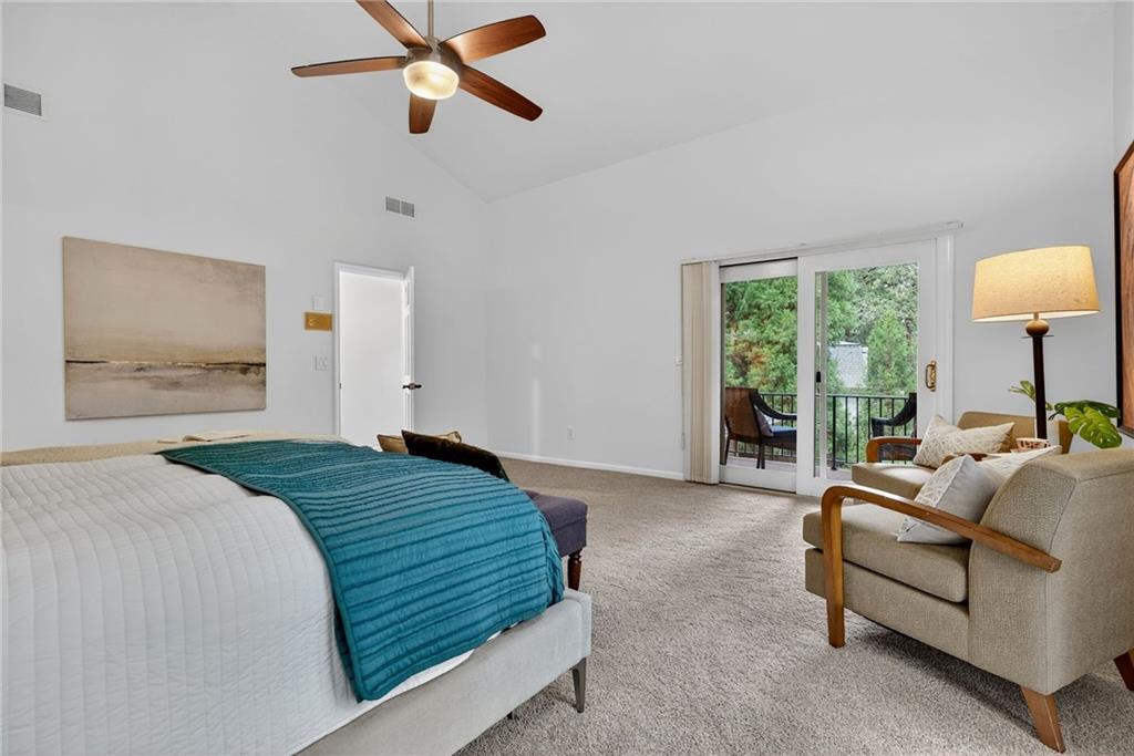 7565 Ball Mill Road Northeast Atlanta, GA 30350 - Photo 36 of 61 a bedroom with a bed couch and window