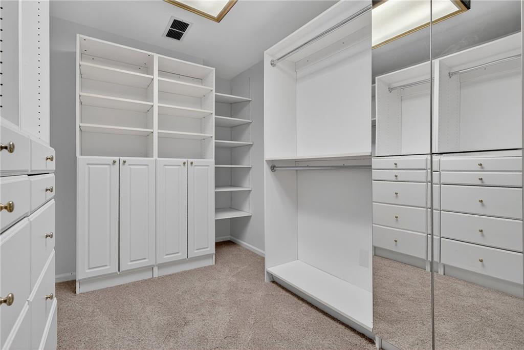 7565 Ball Mill Road Northeast Atlanta, GA 30350 - Photo 42 of 61 a view of an empty walk in closet