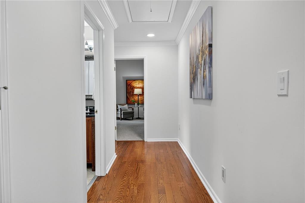 7565 Ball Mill Road Northeast Atlanta, GA 30350 - Photo 43 of 61 a view of a hallway with wooden floor and staircase