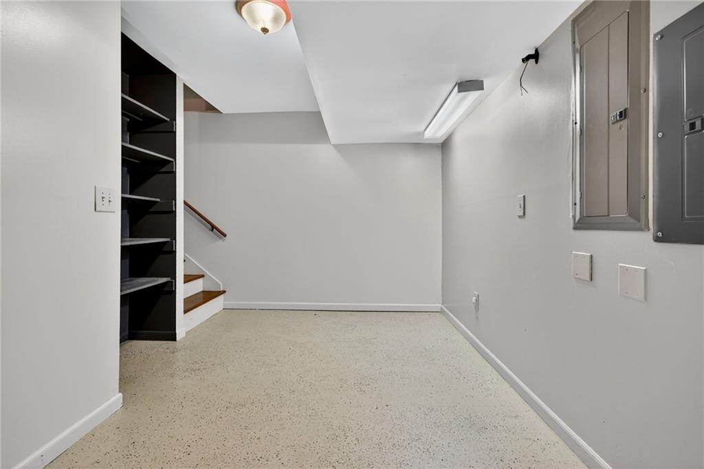 7565 Ball Mill Road Northeast Atlanta, GA 30350 - Photo 48 of 61 an empty room with shelves