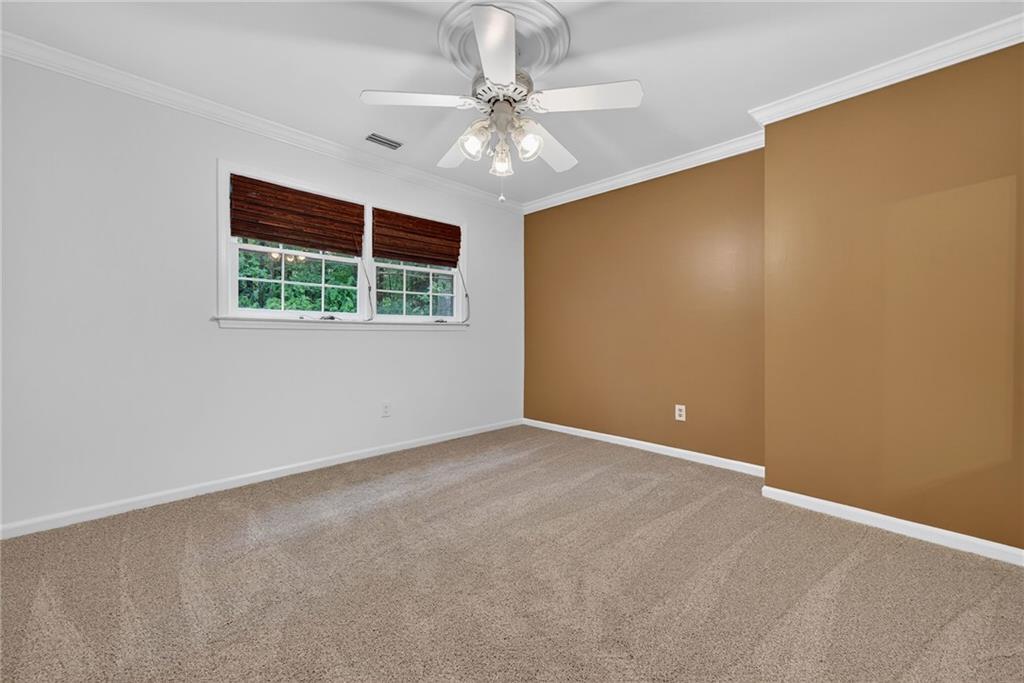 7565 Ball Mill Road Northeast Atlanta, GA 30350 - Photo 50 of 61 a view of an empty room with a window