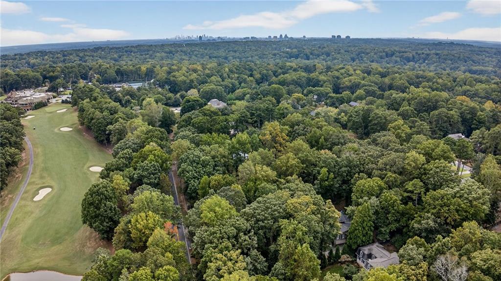 7565 Ball Mill Road Northeast Atlanta, GA 30350 - Photo 57 of 61 an aerial view of a residential houses with outdoor space and lake view