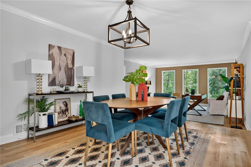 7565 Ball Mill Road Northeast Atlanta, GA 30350 - Photo 10 of 61 a dining room with furniture window and wooden floor