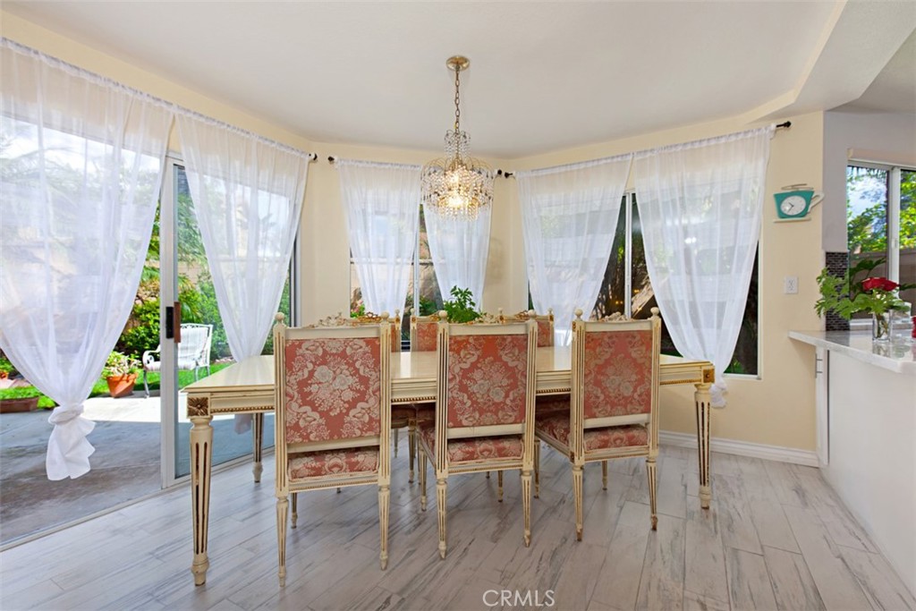 19 Tennessee Irvine, CA 92606 - Photo 11 of 40 a dining room with furniture window wooden floor