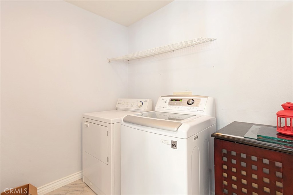 19 Tennessee Irvine, CA 92606 - Photo 17 of 40 a utility room with dryer and washer