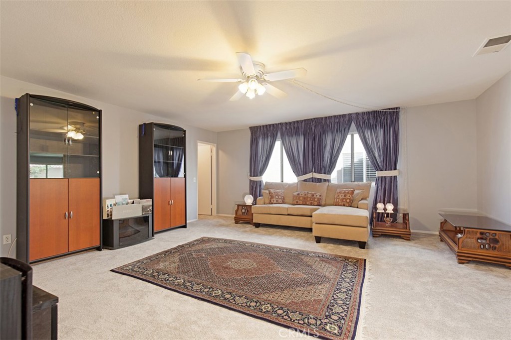 19 Tennessee Irvine, CA 92606 - Photo 20 of 40 a living room with furniture and a wooden floor