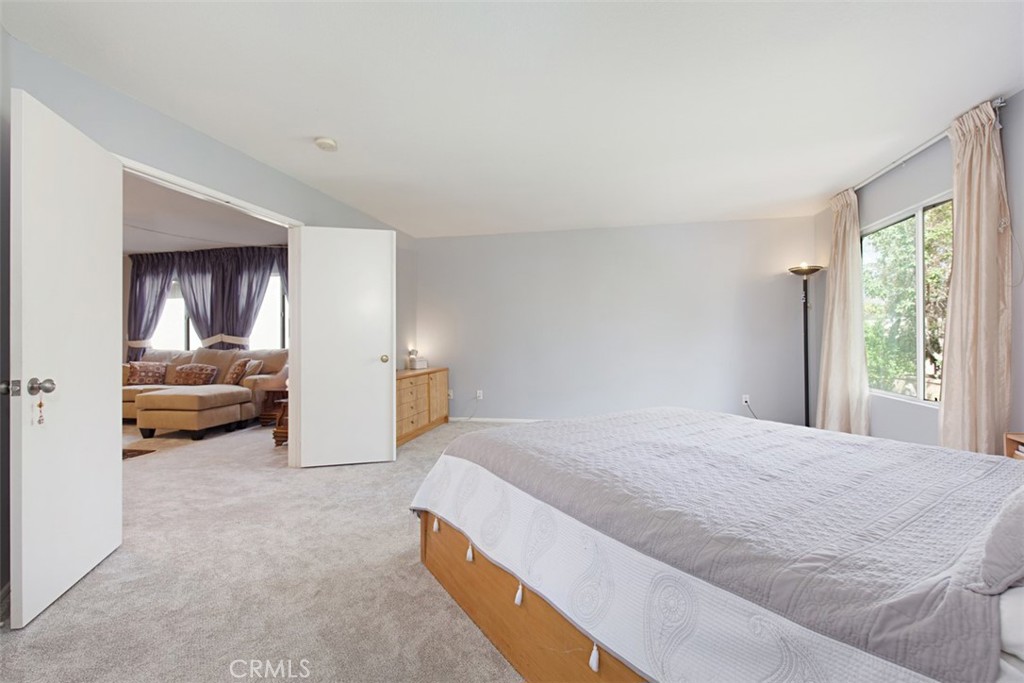 19 Tennessee Irvine, CA 92606 - Photo 26 of 40 a spacious bedroom with a bed and a window