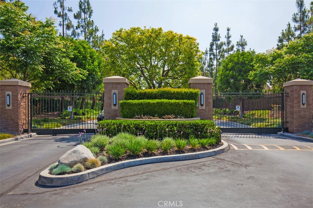 19 Tennessee Irvine, CA 92606 - Photo 36 of 40 a front view of a house with a garden and plants