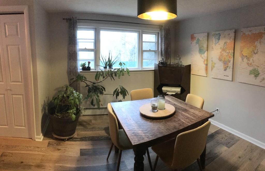 154 Ravenswood Road Waltham, MA 02453 - Photo 4 of 11 a view of a dining room with furniture and window