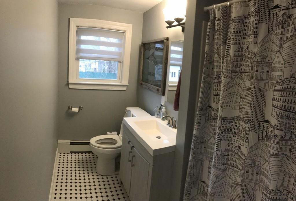 154 Ravenswood Road Waltham, MA 02453 - Photo 7 of 11 a bathroom with a toilet and a shower