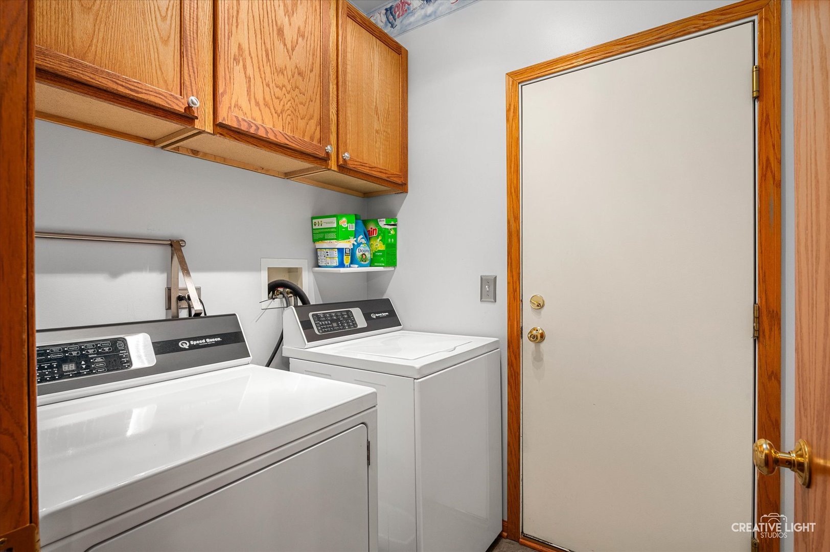 7651 Pin Oak Court Plainfield, IL 60586 - Photo 13 of 31 a view of storage and utility room with washer and dryer