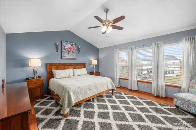 a bedroom with furniture and a window