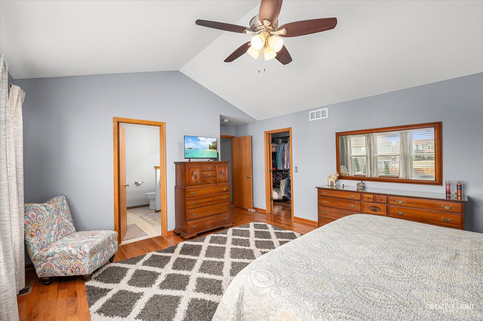 7651 Pin Oak Court Plainfield, IL 60586 - Photo 15 of 31 a bedroom with furniture and a window