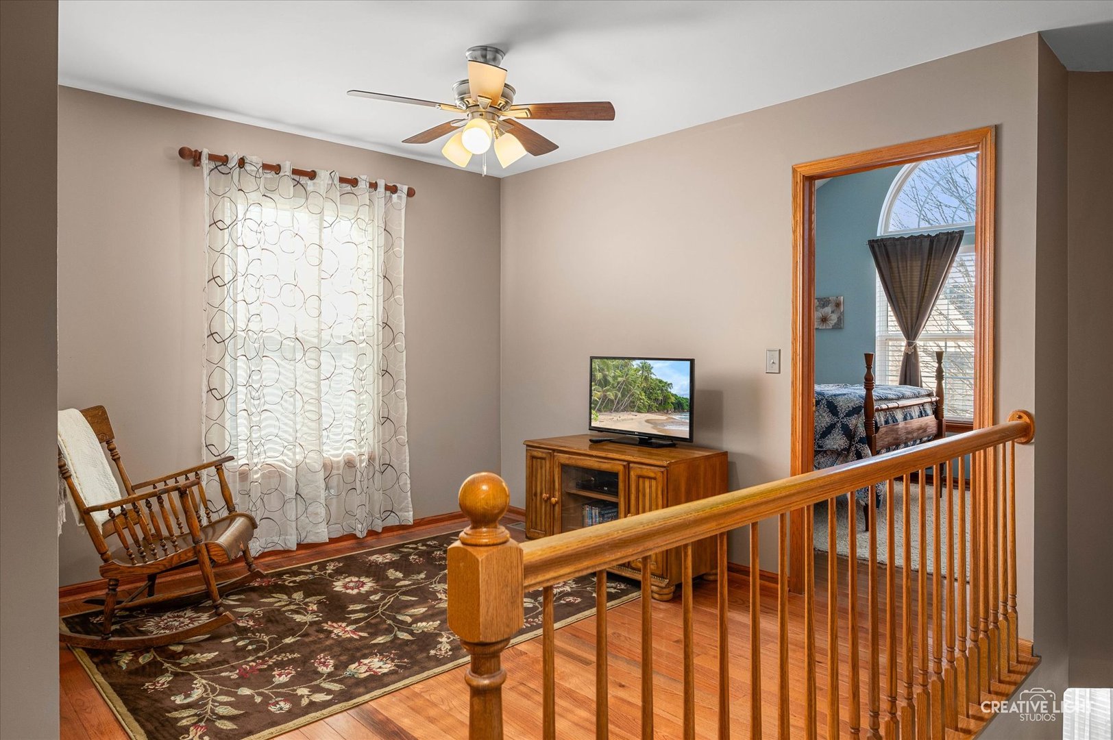 7651 Pin Oak Court Plainfield, IL 60586 - Photo 19 of 31 a bed room with furniture and a window