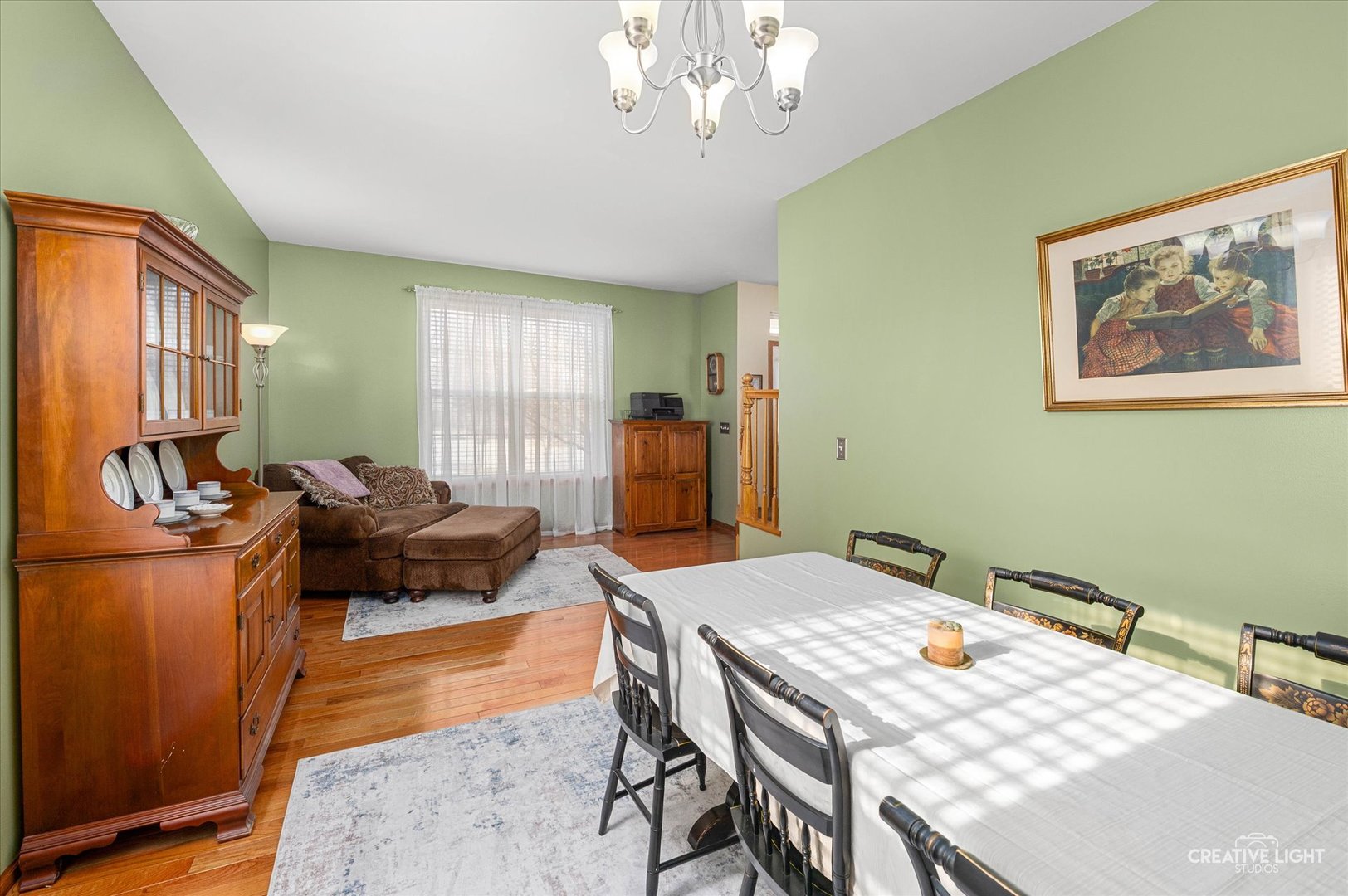 7651 Pin Oak Court Plainfield, IL 60586 - Photo 5 of 31 a view of a dining room with furniture window and wooden floor