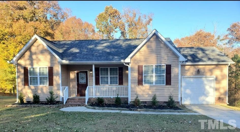 2533 Friendly Trail Raleigh, NC 27610 - Photo 1 of 20 a view of front a house with a yard