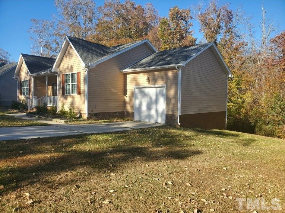 2533 Friendly Trail Raleigh, NC 27610 - Photo 19 of 20 a view of swimming pool with an outdoor space