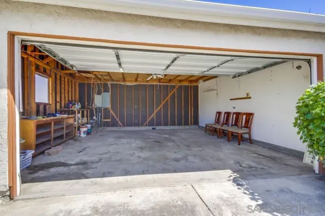 a view of a room with wooden walls