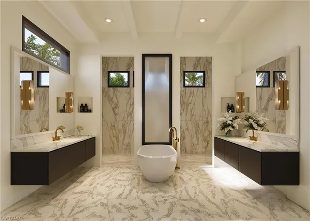 a large bathroom with a double vanity sink toilet and shower