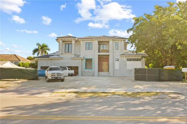 a view of parking space with parked cars