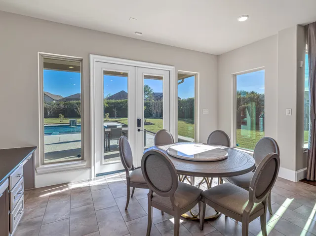 a table and chairs in a room