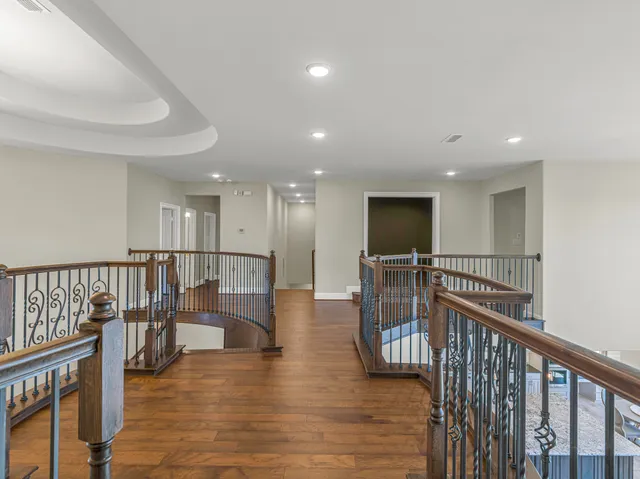 a bedroom with a bed and a table