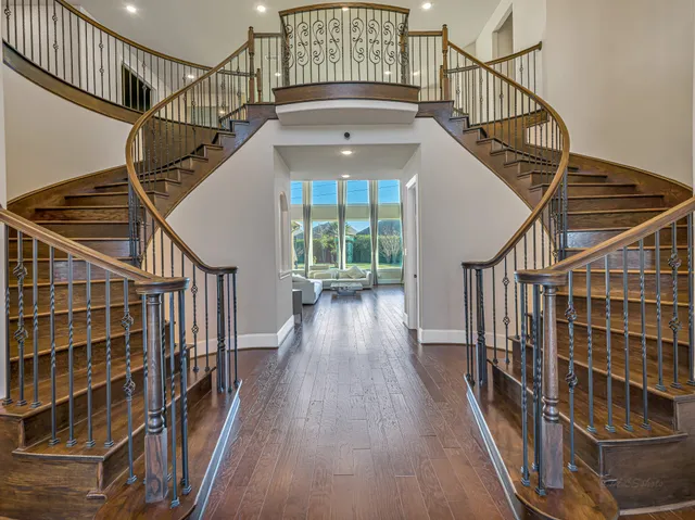 a view of entryway with wooden floor