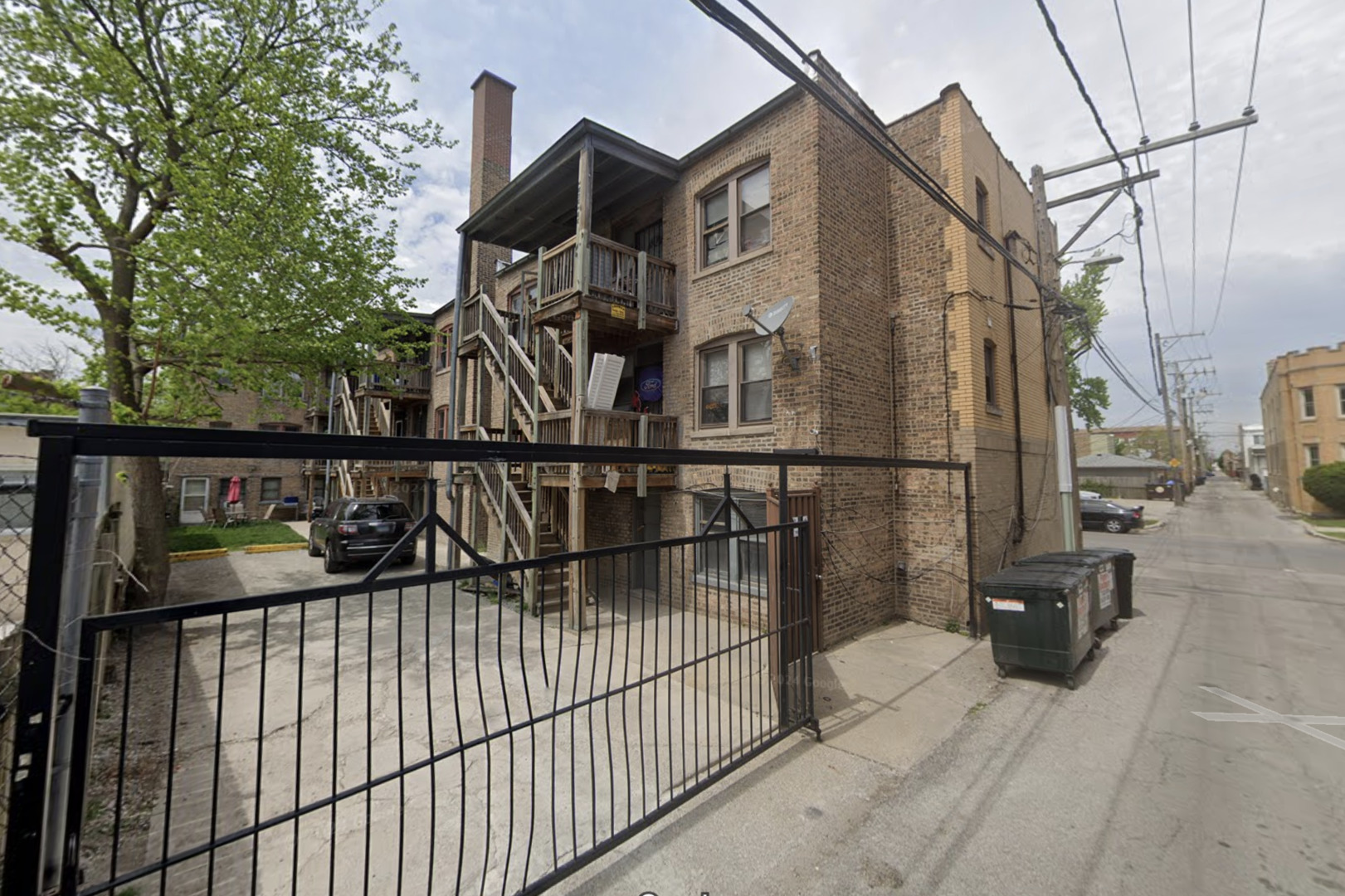 2455 North Laramie Avenue Chicago, IL 60639 - Photo 2 of 5 a view of entryway and a wooden floor